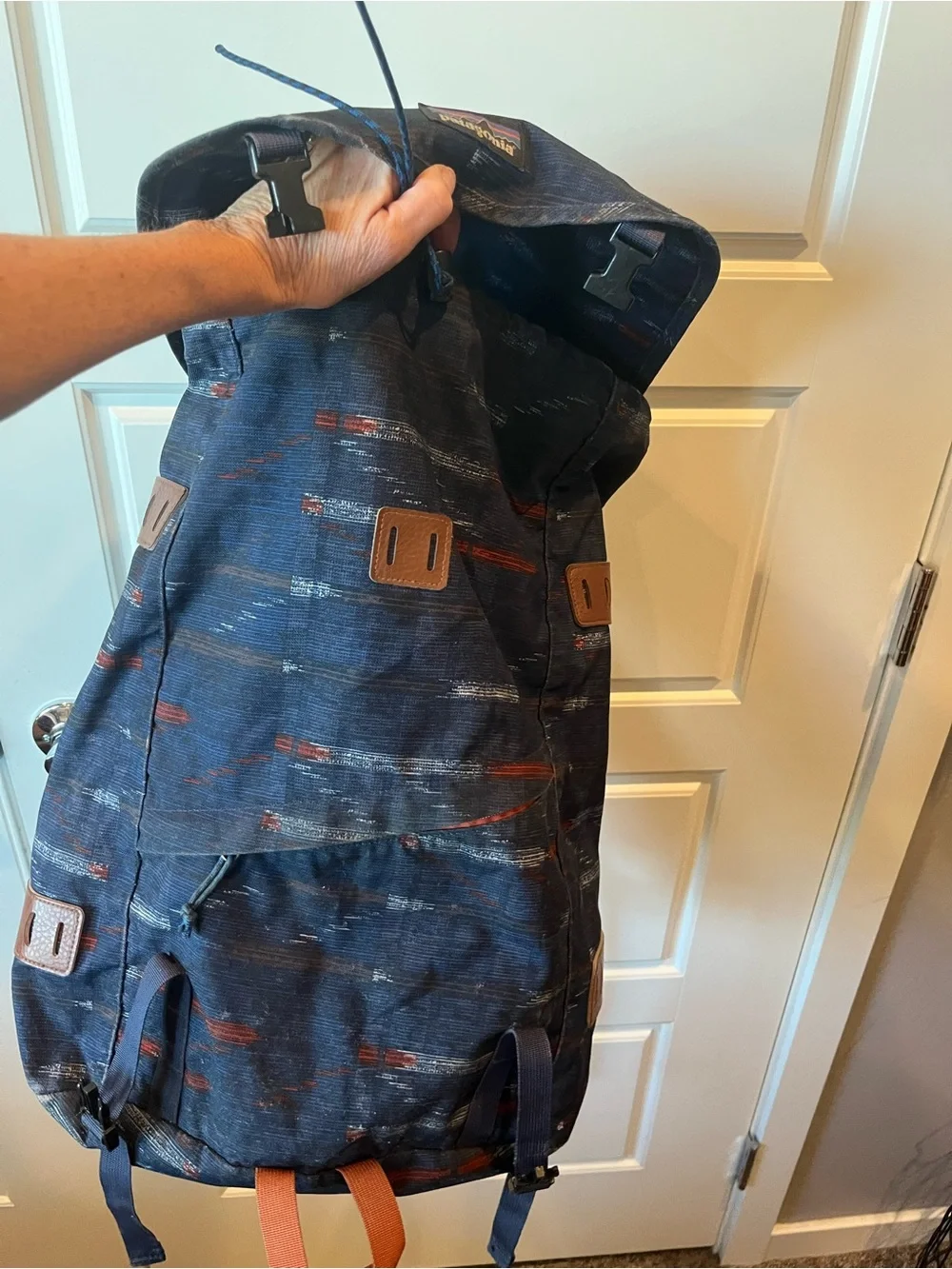 Patagonia Navy Blue Patterned Daypack with Rust Accents.  25L